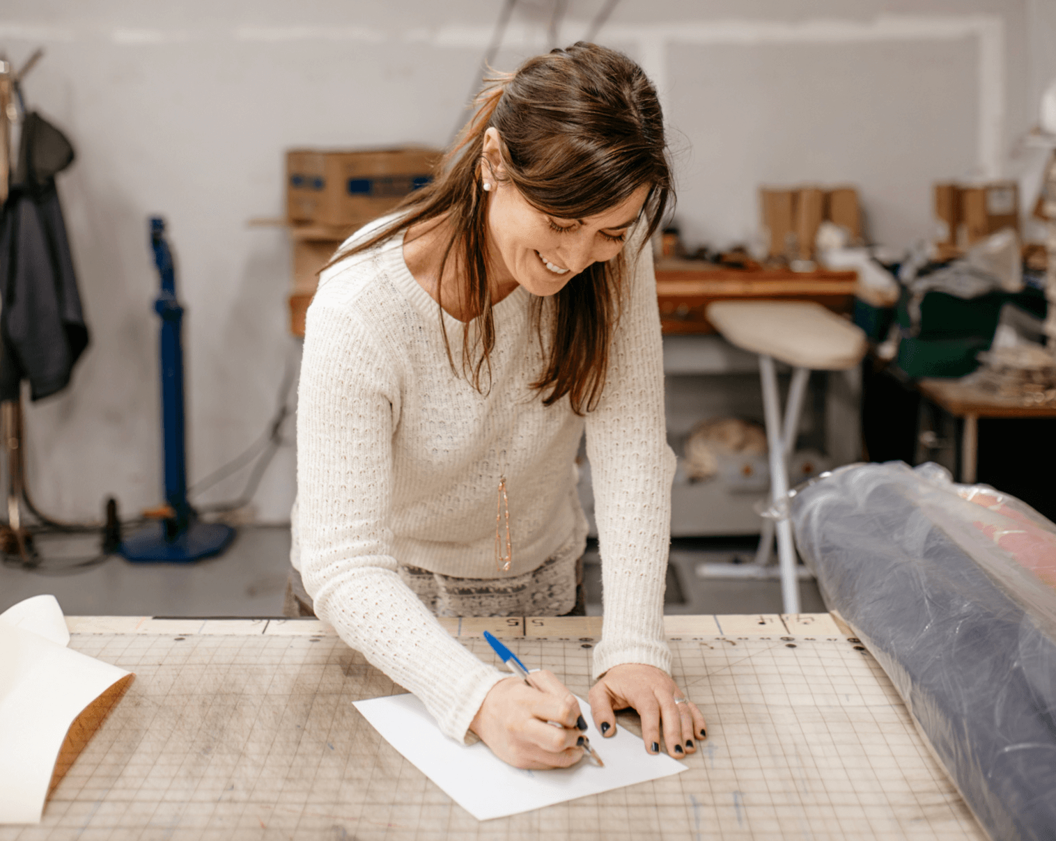 becky drawing in a workshop