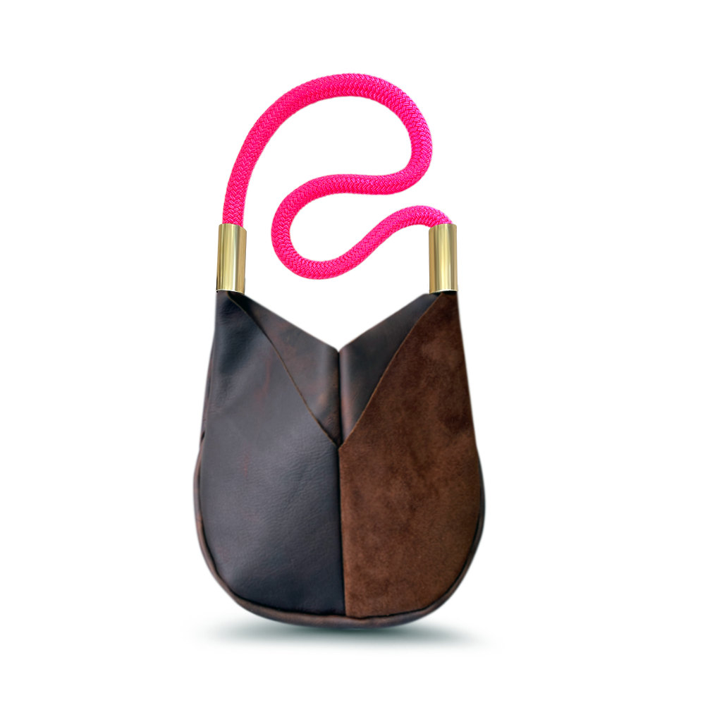 brown leather crossbody tote with neon pink dock line