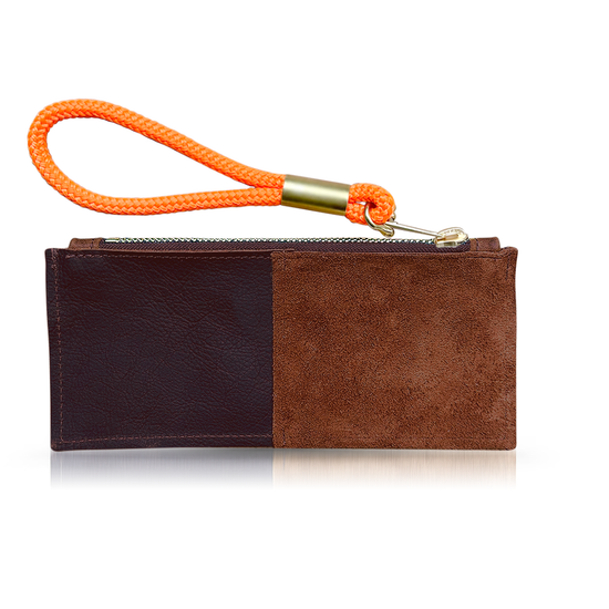 brown leather clutch with neon orange wristlet