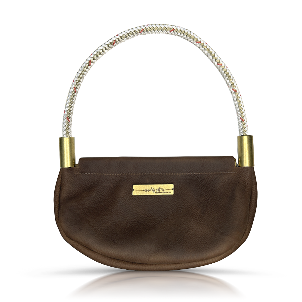 brown leather clam shell bag with gold dockline