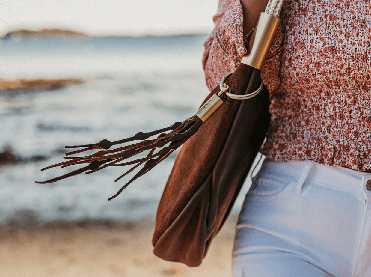 brown leather seaweed tassel on bag