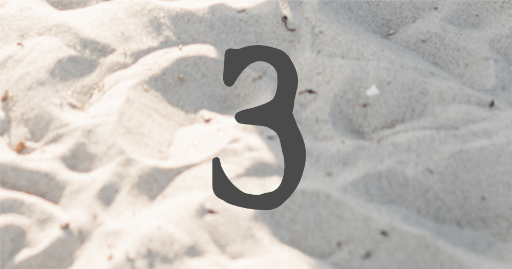 three in sand