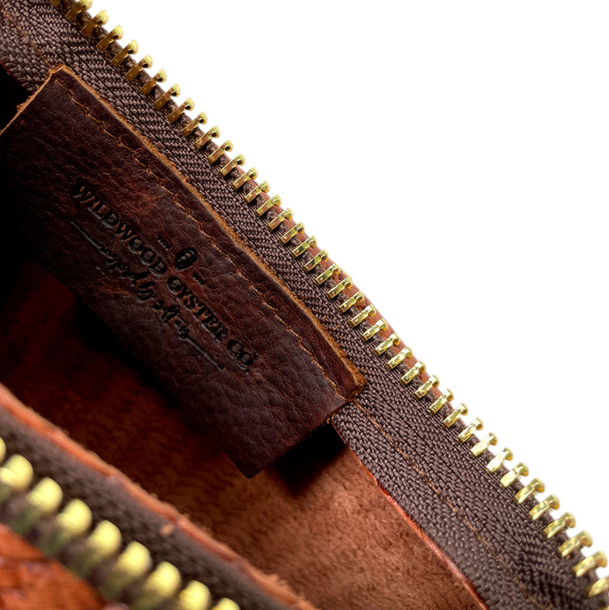 closeup of label inside brown leather bag
