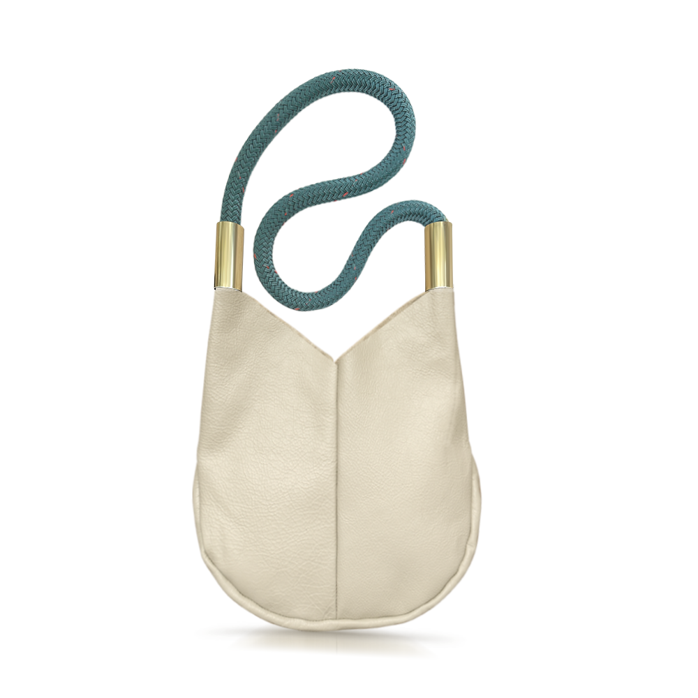 beige leather crossbody tote with teal dock line