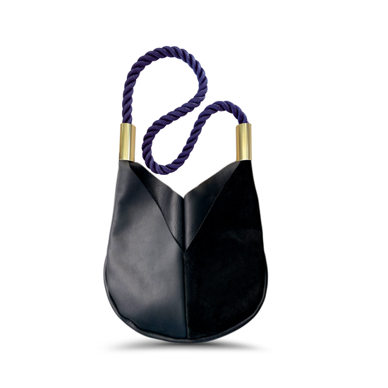 black leather crossbody tote with navy dock line