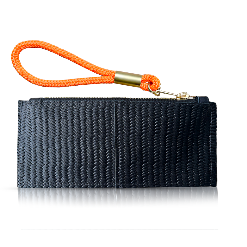 black basketweave clutch with neon orange wristlet