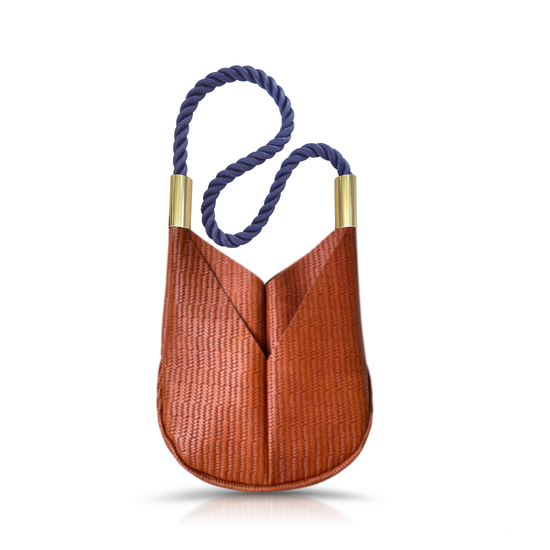 brown basketweave small crossbody tote with navy dock line handle