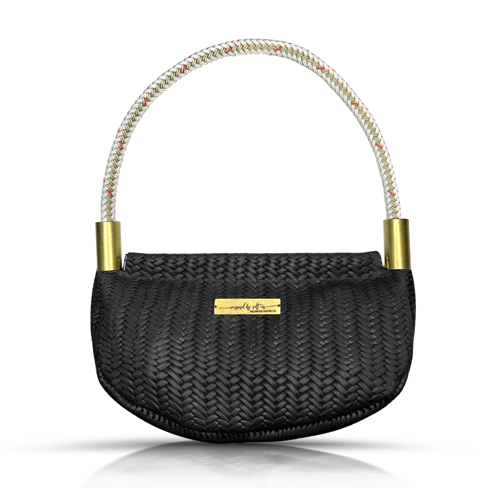 black basketweave leather clamshell bag with gold dockline handle