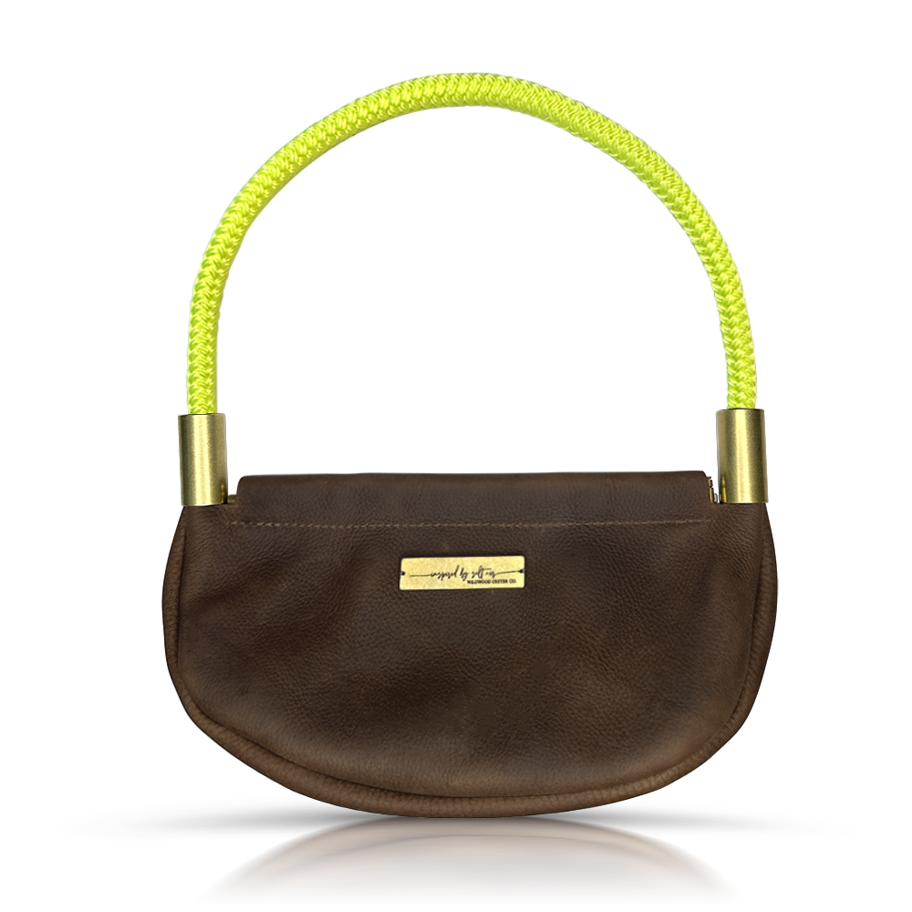 brown leather clam shell bag with neon yellow dockline