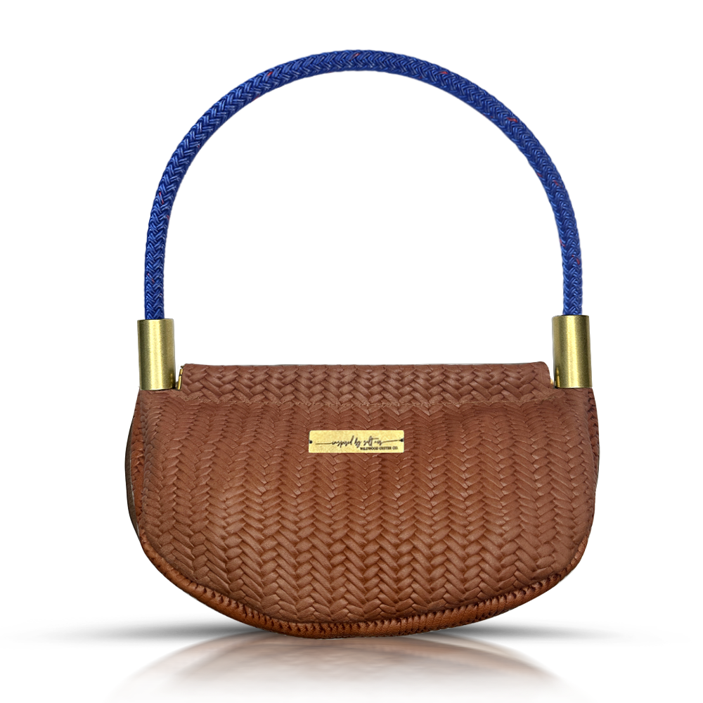 brown basketweave leather clamshell bag with harborside blue dockline handle