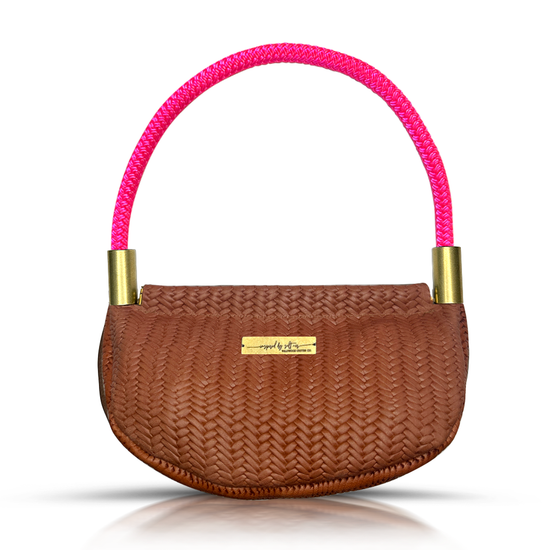 brown basketweave leather clamshell bag with neon pink dockline handle