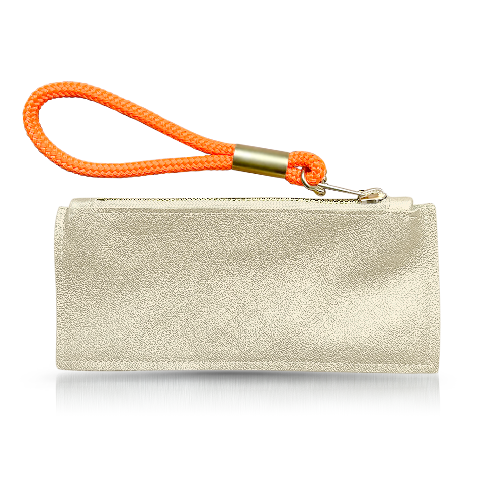 gold leather clutch with neon orange wristlet