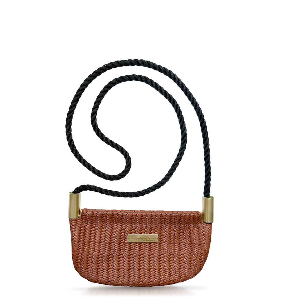 brown basketweave leather oyster shell bag with black dock line
