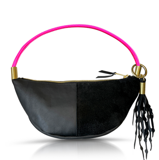 Load image into Gallery viewer, black leather sling bag with neon pink rope
