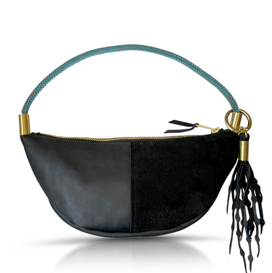 black leather sling bag with teal rope
