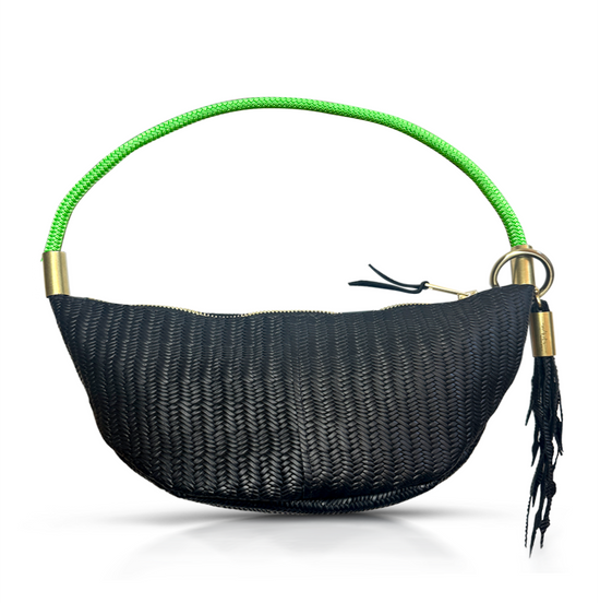 black basketweave leather sling bag with neon green dock line handle