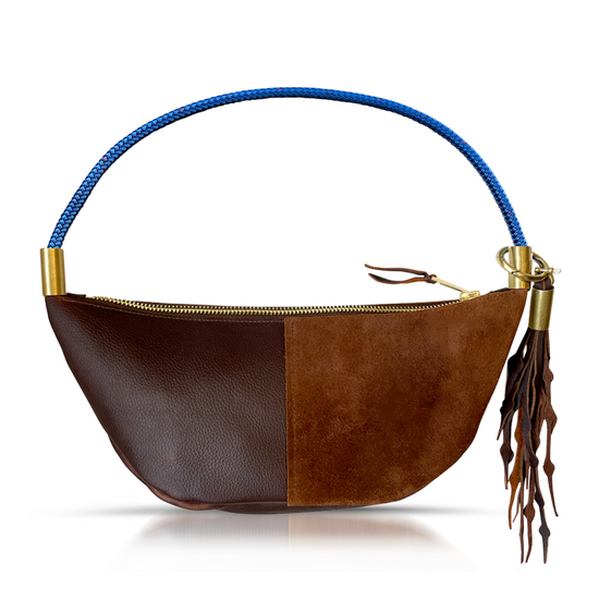 brown leather sling bag with blue dock line