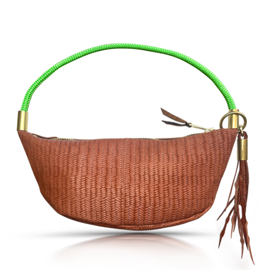 brown basketweave sling bag with neon green dock line handle