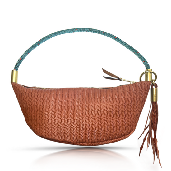 brown basketweave sling bag with teal dock line handle