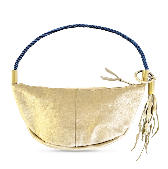 Load image into Gallery viewer, gold leather sling bag with navy dock line
