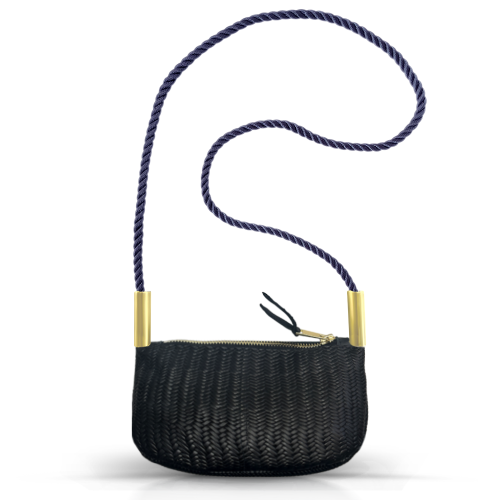 black basketweave leather zip crossbody tote with navy dock line handle