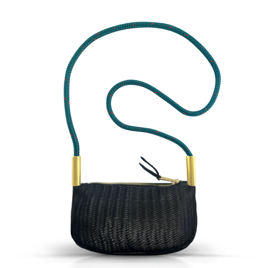 black basketweave leather zip crossbody bag with teal dock line handle