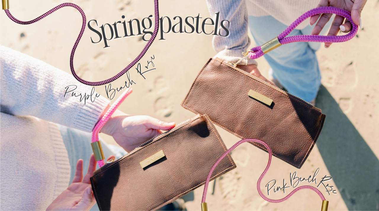 Two handbags with pink straps on a beach, labeled 'Spring pastels' and 'Pink and Purple Beach Rose'.