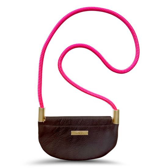 brown leather oyster shell bag with neon pink dock line