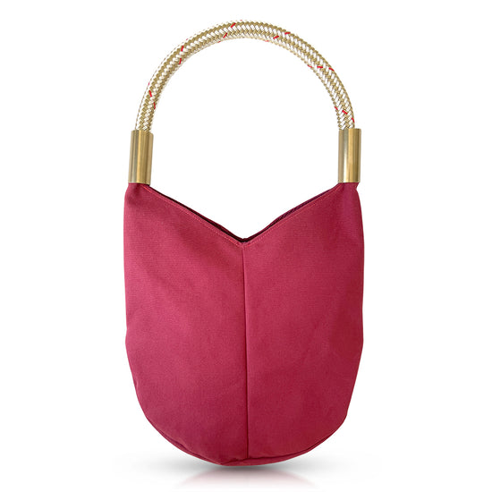 Load image into Gallery viewer, the back of a red canvas bag with gold rope
